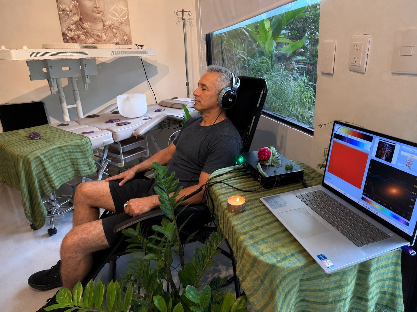 A guest relaxing during a Biofeedback assessment at Vitalara
